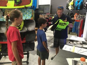 family getting gear at proshop